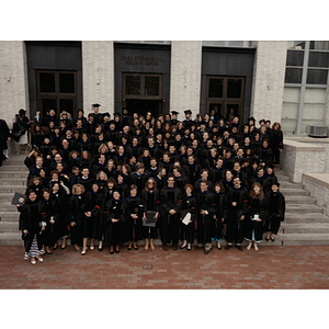 School of Law graduates posing on the steps of the Carl Stephens Ell Student Center