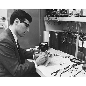 Co-op student building a test instrumentation circuit at General Electric