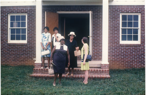 Marjorie Merrill (far right) and church ladies in front of rebuilt Antioch Church, Blue Mountain, Miss.