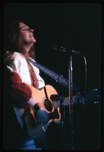 Judy Collins: with guitar, performing on stage