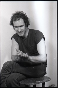 Studio portrait of Richard Safft, seated on a stool