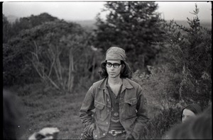 Daniel Brown, standing in a field