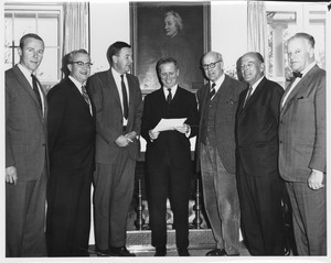 John Lederle, Kevin H. White, Charles R. Longsworth, Calvin H. Plimpton, Thomas C. Mendenhall, Richard G. Gettell, and Winthrop S. Dakin in Amherst at a presentation ceremony of Hampshire College Charter