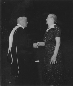Willard and Helen Munson holding hands