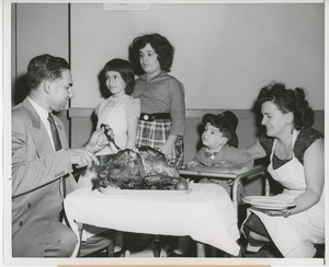 Young client and his family at Thanksgiving celebration