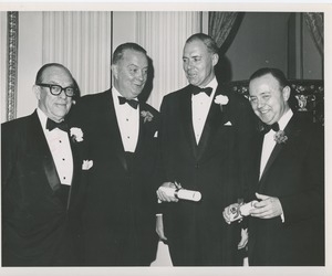 Unidentified men in tuxedos at an ICD event