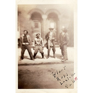 A group of Winifred Irish Hall's childhood friends pose on a sidewalk