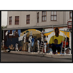 Ten young men and women from the Boys and Girls Clubs of Boston working on a mural project