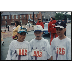 Three boys pose for a shot during the Battle of Bunker Hill Road Race