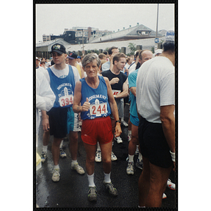 A man gives a thumbs-up during the Battle of Bunker Hill Road Race