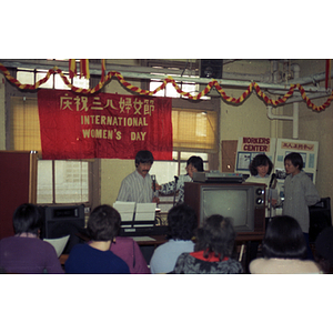 Seated guests at an International Women's Day event