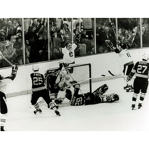 NU men's hockey player Wayne Turner scores winning point for the Beanpot championship