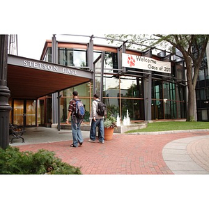 Two Torch Scholars walk into Stetson East dormitory