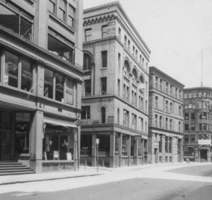 "Cor. Columbia and Essex St., looking east on Essex St."