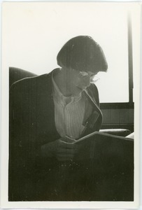 Mark Sommer seated reading