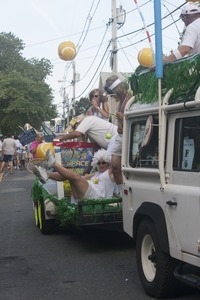 Parade marchers dressed as 1970s-era tennis players : Provincetown Carnival parade