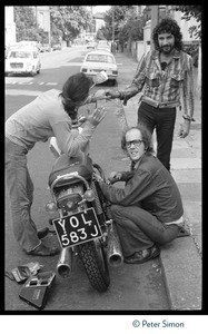 Cat Stevens (rear) and two friends with a motorcycle