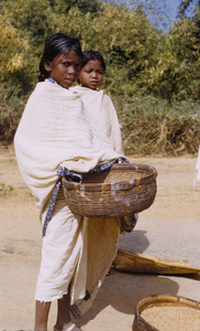 Young woman carrying a basket in the Ranchi district