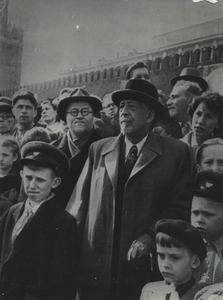 W. E. B. Du Bois standing in a crowd