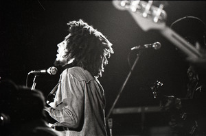 Bob Marley and the Wailers at Paul's Mall: Marley from behind