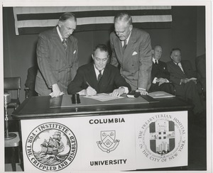 Joseph Campbell, treasurer at Columbia University, signing affiliation agreement