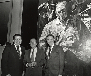 Mayor Raymond L. Flynn, painter Francisco Rodón and City Councilor Robert Travaglini in front of Rodón's portrait of Luis Muñoz Marín