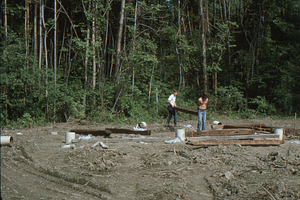 Laying out beams at the Moon Barn Raising Site (1) at entrance to Hopkins Forest on 2 August 1975.
