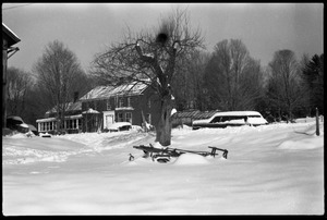 View looking up to the front of the house under heavy snow, Montague Farm commune
