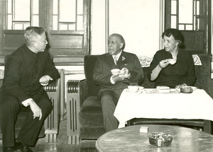 W. E. B. Du Bois and Shirley Graham Du Bois at tea with an unidentified man, China