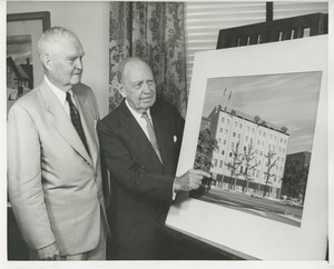 Bruce Barton and Jeremiah Milbank Sr. posing with an illustration of prospective building plans