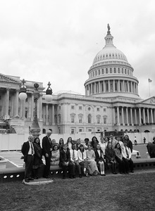 Congressman John W. Olver with group of visitors, posed in front of the United States Capitol building