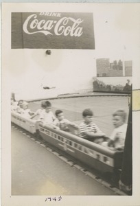 Joel and Paul Kahn on an amusement park train