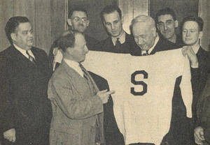 William G. Morgan receiving varsity sweater