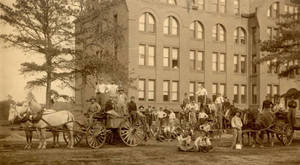 Workers outside the Dormitory Building, 1897