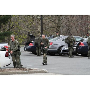 FBI agents in Watertown parking lot - Digital Commonwealth