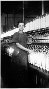 One female textile worker at a spinning frame. [01]