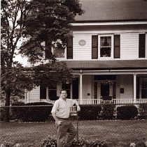 Richard Duffy in front of B. F. Wood house