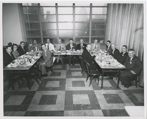 Attendees sitting down to a meal at a joint meeting of the American society of tool engineers and ICD