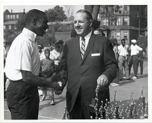 Police Commissioner Edmund McNamara with an unidentified young man