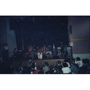 Musicians performing on stage at the Jorge Hernandez Cultural Center.