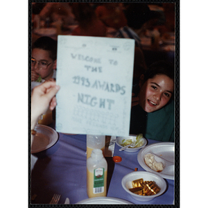 Out-of-focus photograph of a program cover that reads "Welcome to the 1993 Awards Night"