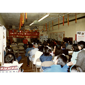 Suzanne Lee speaking at a Chinese Progressive Association event