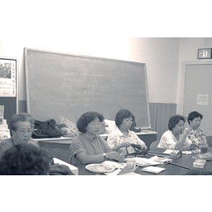 Association members, including Suzanne Lee, at a meeting