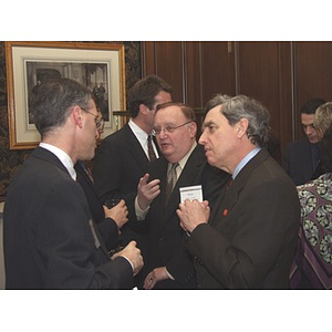 President Richard Freeland talks with group at gala dinner