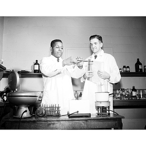 Biology professors Charles Goolsby and Henry Werntz in a laboratory