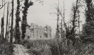 View of a narrow gauge railway leading up to a destroyed stone chateau which had been occupied by the Kaiser, Pinon