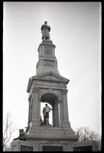 Crowd on Cambridge Common: Civil War Memorial (statue of Abraham Lincoln hung with sign advertising the opening of the Cambridge Electric Ballroom)