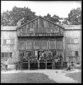 Commune members at the entrance to the Brotherhood of the Spirit dormitory in Warwick, Mass.