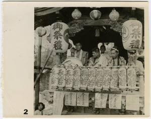 Close-up of men on a float in a matsuri procession
