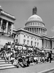 Congressman John W. Olver (right) and visitors, posed on the steps of the United States Capitol building